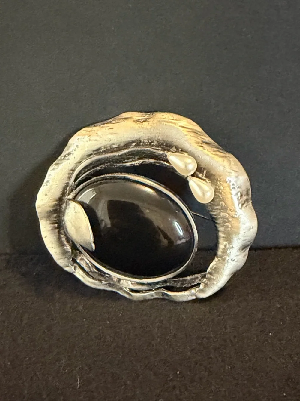 Vintage Artisan Silver-Tone Brooch with Black Cabochon and Pearl Accents